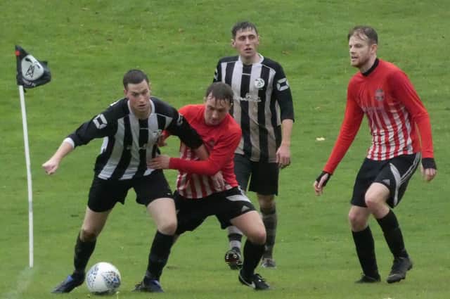 Tibshelf [stripes black and white]  beat  Cromford and Wirksworth Res 5-0. Pic by Martin Roberts