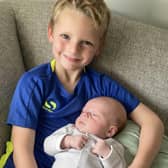 Jack Reid loves his little cousin Lewis who doctors have described as a miracle baby.
