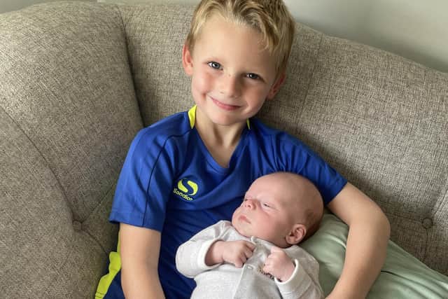 Jack Reid loves his little cousin Lewis who doctors have described as a miracle baby.