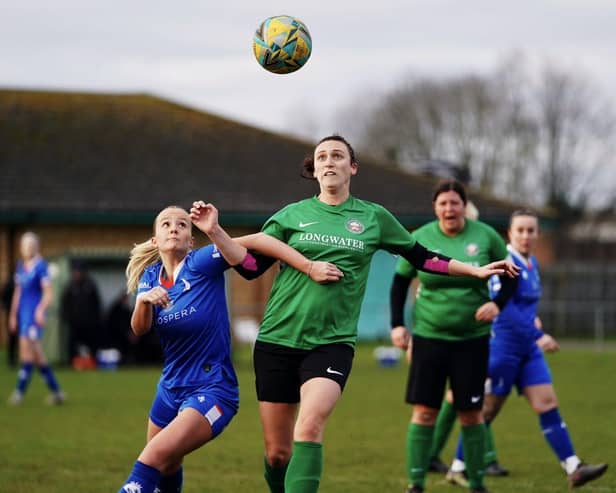 Chesterfield's Sophie Marshall (left) tussles for possession at Sleaford. Photo: Ed Mayes Photography.