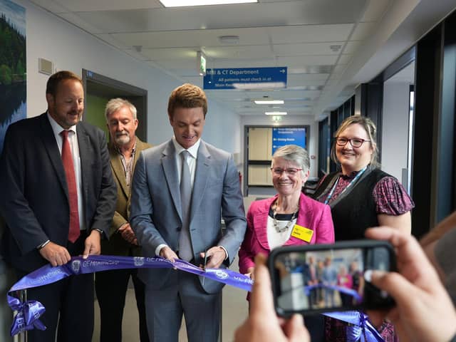 Minister for Health Innovation James Frith MP cuts the ribbon alongside Toby Perkins MP, Steve Ward (Project Manager, DCHS), Jackie Smith (CRH Chair), and Jen Leah (DCHS Chief Finance Officer)