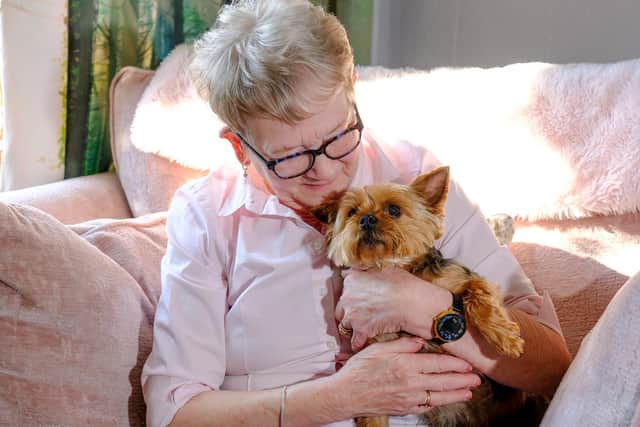 Brenda Richards with her Yorkshire terrier Cleo.