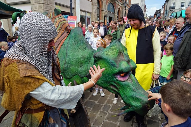 Chesterfield medieval fun day returns. A dragon takes a walk through the town.