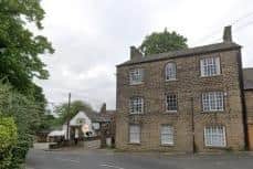 Listed building consent is being sought to convert commercial premises at The Grange, Church Street, Dronfield into four apartments.