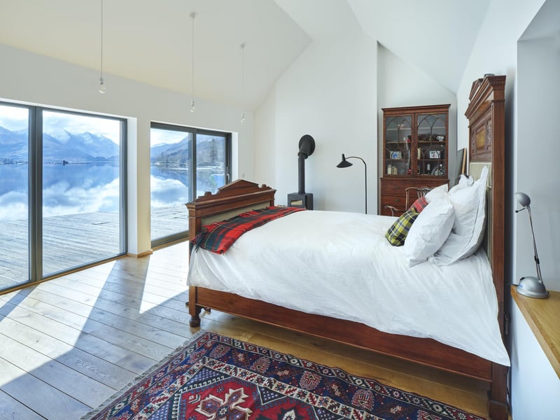 Bedroom with log burner