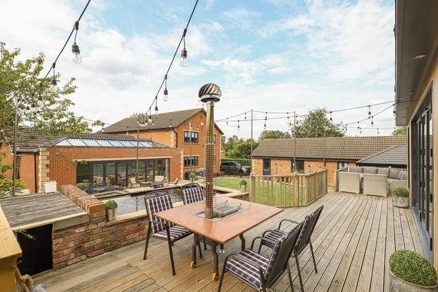 A decked area enables a panoramic view of the garden.