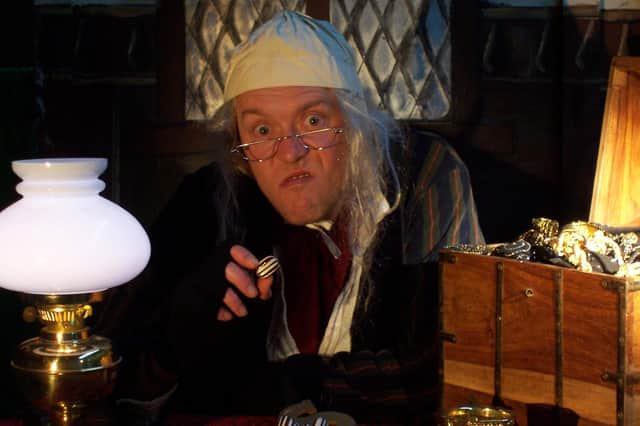 Andy Barrow plays Scrooge in Oddsocks' production of A Christmas Carol.