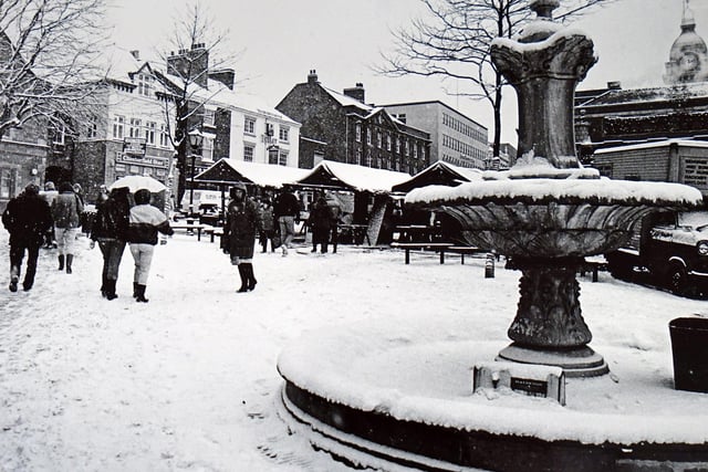 New Square in Chesterfield town centre, seen here during a snow storm in 1987.