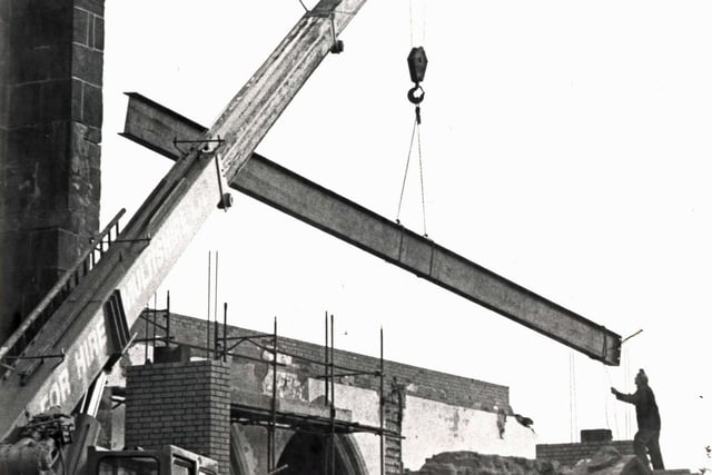Putting in new roof  beams at Heanor Church, 1981.