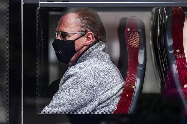 It is now mandatory to wear face masks on all public transport, including taxis and private hire cars. (Photo by Jeff J Mitchell/Getty Images)