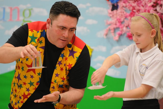 Magic Andrew performs science tricks for pupils at Hebburn Lakes Primary School. Were you there for the fun in 2014?