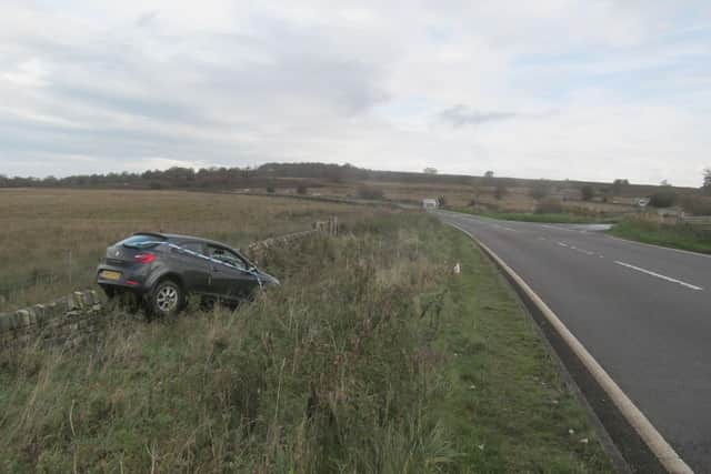 The aftermath of this accident showed the driver had partially crashed through a stone wall. (Photo: Contributed)