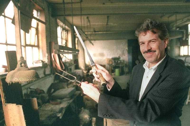 Mike Seeds in the old works at Binghams Cutlery,Malinda Street with a traditional Sheffield sharpening steel and fork in 1999