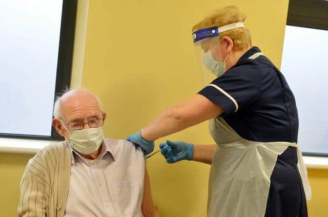 Army veteran Robert Stopford-Taylor, 101, was the first person to receive the vaccine at Stubley Medical Centre in Dronfield Woodhouse. Picture by Brian Eyre.