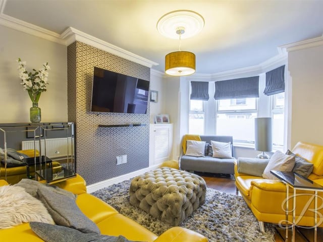 With laminate flooring, central heating radiator and bay window to front elevation allowing for ample natural light.