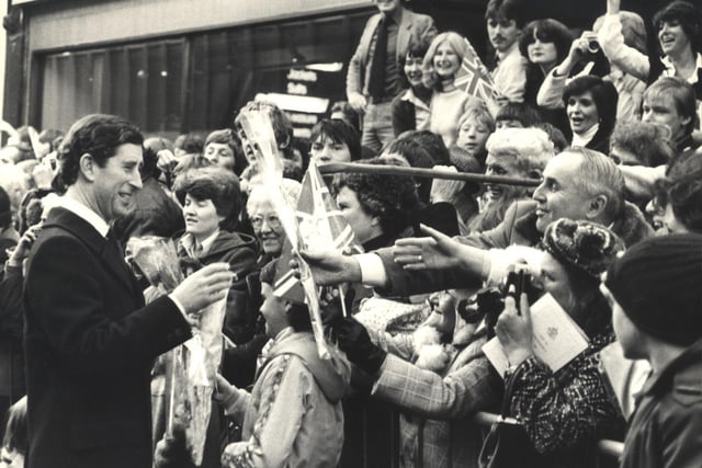 Prince Charles is greeted by crowds during his visit to Chesterfield to open the Pavements Shopping Centre.