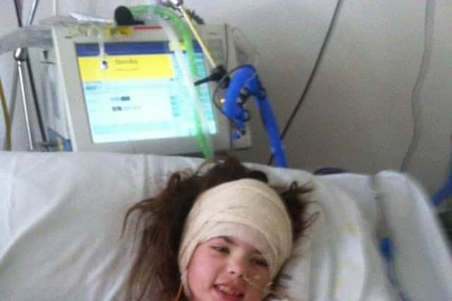 Chloe Parkes underwent life-saving operations on a stage 4 brain tumour.