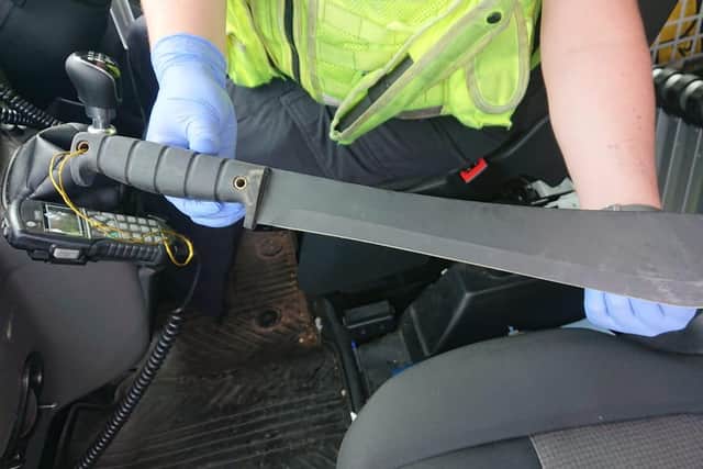 Police stopped a suspected drink-driver who was found sitting on a “massive” machete.