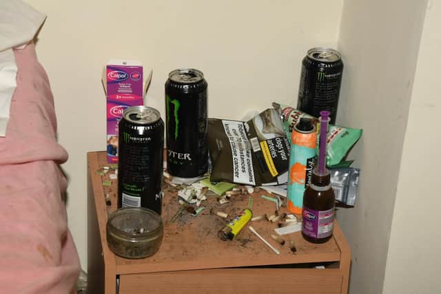 Officers found several energy drink cans, tobacco and cigarette leftovers at the couple's home.