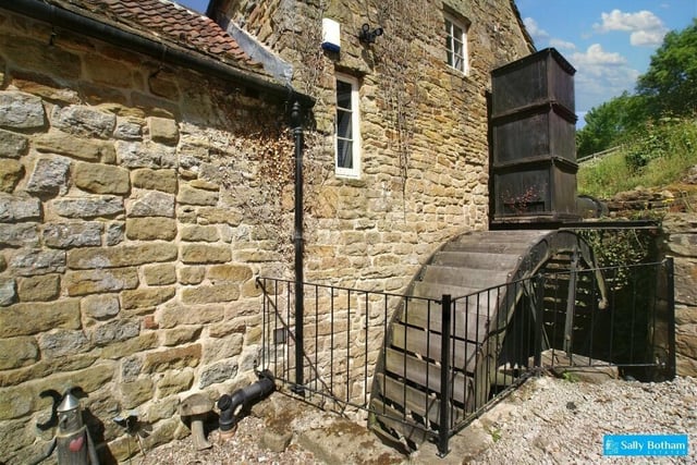 The exterior water wheel can be viewed from the kitchen.