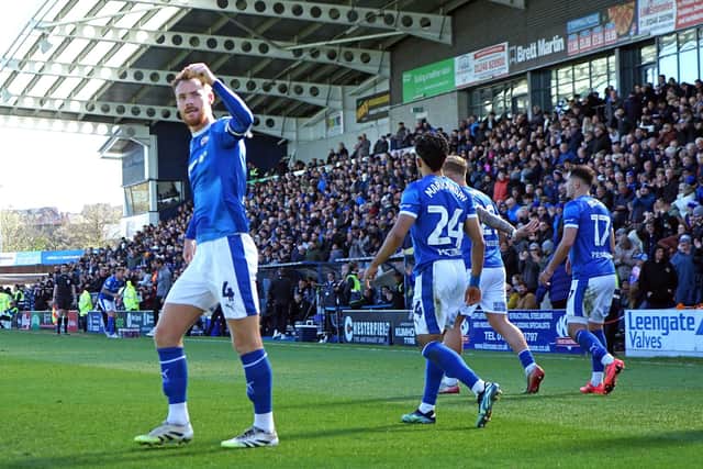 Tom Naylor celebrates his opener against Tranmere Rovers, but the Spireites couldn't hold on. Pictures by Brian Eyre