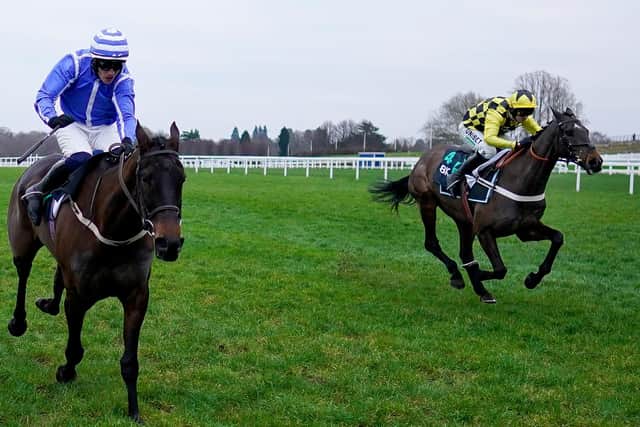 Shishkin somehow overhauls Energumene (left) to win the race of the season so far at Ascot in January. They clash again in the Betway Queen Mother Champion Chase at Cheltenham on Wednesday. (PHOTO BY: Alan Crowhurst/Getty Images)