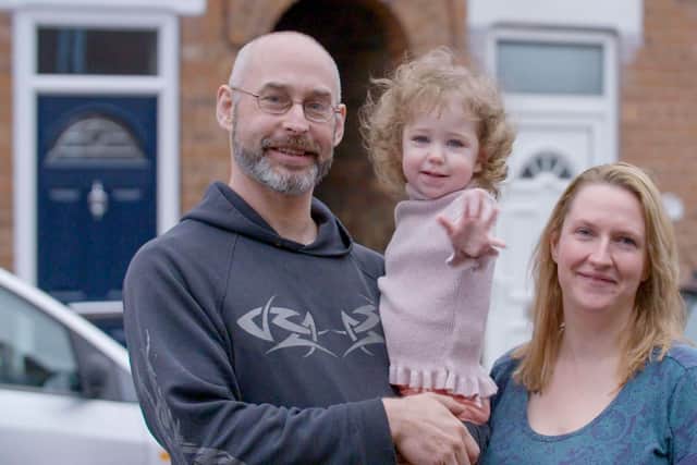 Dan Gore, Cheri Southam and Harper outside their home on Shirland Street, Chesterfield.
