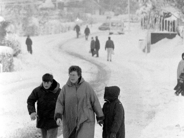 Do you remember wrapping up to trudge through the snow?
Can you spot anyone you know in this wintry snap?