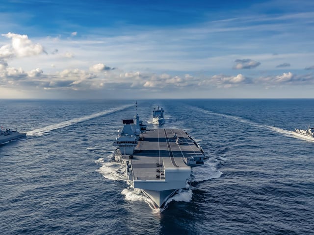 Norwegian anti-submarine frigate HNoMS Thor Heyerdahl joined the UK's Carrier Strike Group as it transits east across the Atlantic following deployment to the USA. The frigate joined HMS Queen Elizabeth, fellow submarine hunter HMS Northumberland and tanker RFA Tideforce. This image was part of the winning selection by Photographer of the Year Leading Photographer Kyle Heller.