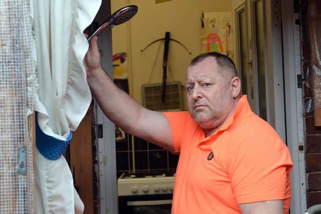 Tony Rawson has been forced to shower outside for over two years after delays in the council adapting his house