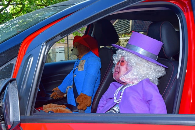 The Queen arrives in style with Paddington Bear