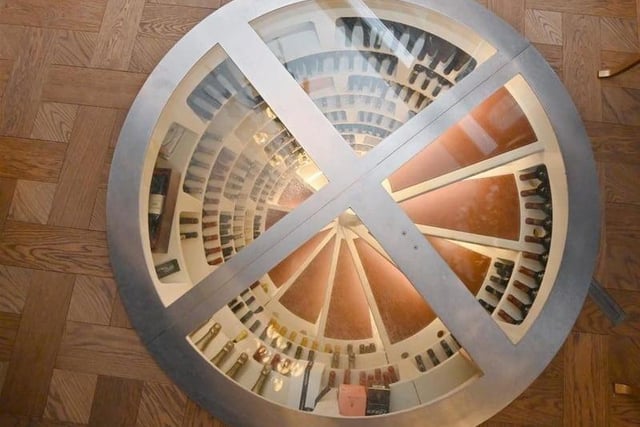 A look down into the incredible wine cellar shows the sheer space available for the occupants of this home to fill with their favourite bottles.