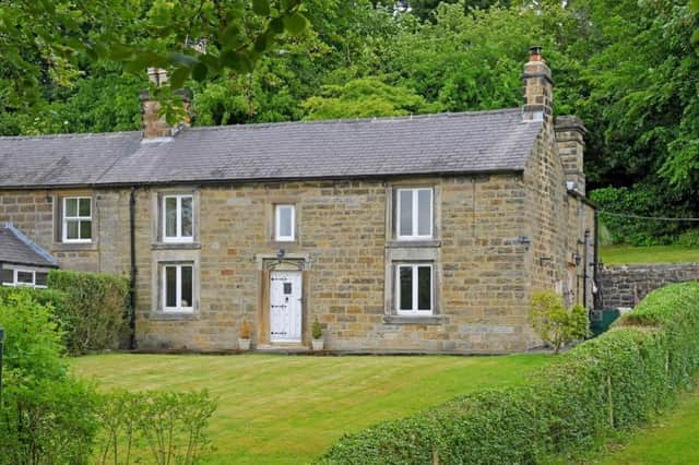 Beechfield House in a semi-rural location at Far Hill, Ashover, is on the market for £899,000.