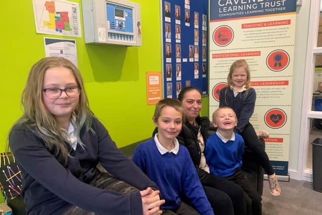 Mum Jaylene (centre) with her children, who all attend Barrow Hill Academy. They are one of the first families to benefit from a community fund set up after more than £12k was raised in November