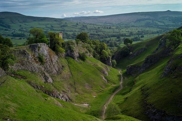 The imposing ruins of Peveril Castle, built in 1176, stand high on the hill above Castleton. The castle is reportedly haunted by a white knight who stands by the rampart. Others have also spotted a phantom horse and hound near the keep.