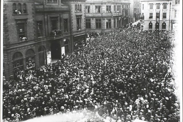 A vast crowd gathers n Chesterfield Market Place during a Chesterfield by-election in 1913.