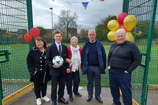 Pictured is Parish Council Clerk, Lisa Powell, Kenzie, Councillor Mary Dooley, Brian Wheatcroft and Councillor Richard Street officially opening the new 3G pitch