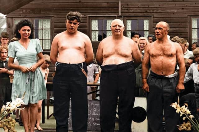 Biggest biceps competition in the 1950s and among the male contenders is Harold Cope, third from left,  a world champion strongman from Ripley who could  break five six-inch nails with his bare hands in 68 seconds. Malcolm Bond and Charlie Hollis are pictured left and centre.