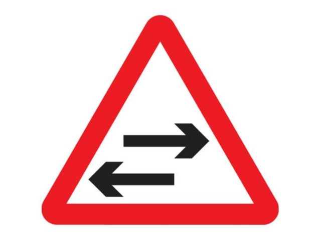A. Look left and right
B. Traffic in both directions
C. You may turn left or right
D. Two way traffic crosses one way road