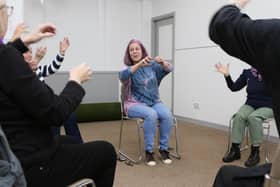 A try out session for seated laughing yoga.