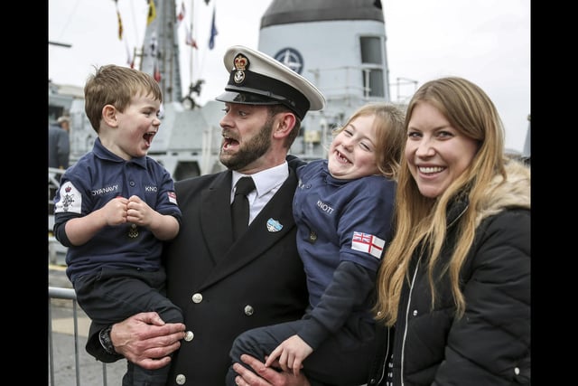 A member of HMS Cattistock's crew returns home to his family after ten months away on a NATO deployment. Royal Navy Royal Marines Charity Family and Friends Award. By Leading Photographer Barry Swainsbury