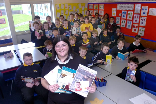 Pictured at   Hady Primary school, Hady Lane, Chesterfield. Seen is the class of Year 6, with their teacher  Ceri Pratt with pictures and letters from  celebrities and the Queen, who replied to  letters sent to them asking  them to name their favorite book.