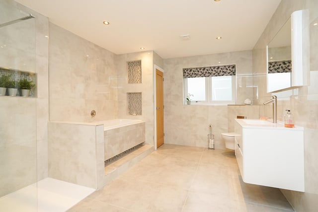 The first floor also features a luxurious family four-piece bathroom, offering total flexibility for a growing family