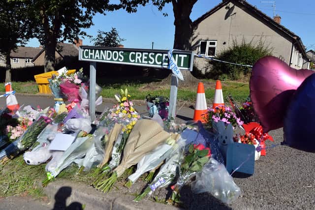 Tributes left at the scene of the quadruple murder on Chandos Crescent, Killamarsh