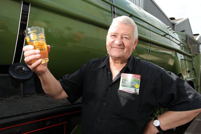 Graham White raised a glass to a successful Rail Ale festival in 2014.