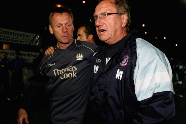 Stuart Pearce, manager of Manchester City, congratulates Roy McFarland after Chesterfield's Carling Cup 2nd round win over City on September 20, 2006.