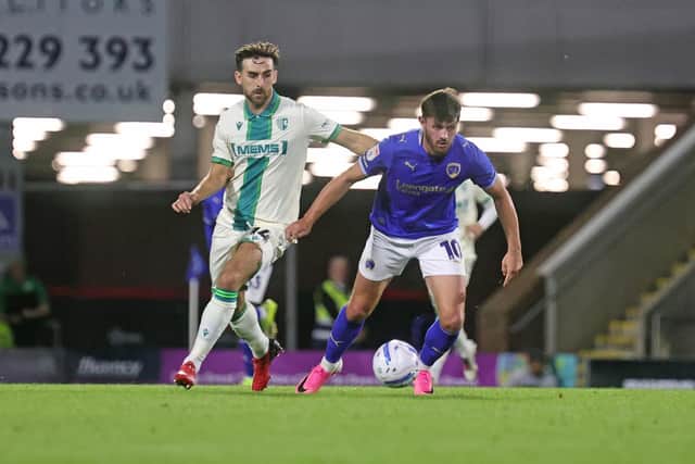 Lee Bonis gets past Robbie McKenzie in the draw with Gillingham