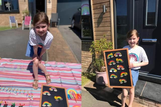 Freya Hill with some of her colourful creations.