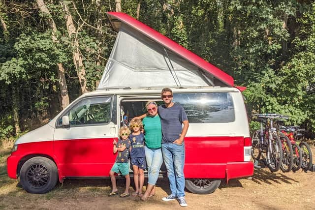 Jay and Jenny Lynn and their sons Arthur and Ezra with their much-loved campervan.