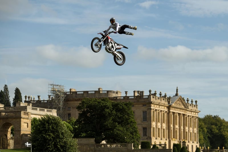 Dan Whitby of the Bolddog Lings FMX Display Team performs in the Grand Ring on the first day of the Chatsworth Country Fair in the grounds of Chatsworth House, on August 30, 2019. (Photo credit OLI SCARFF/AFP via Getty Images)